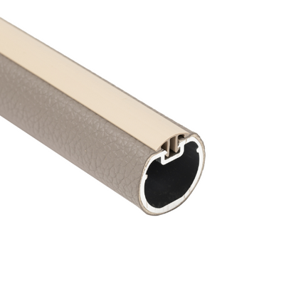 A section of a round leather closet rod with an anodized aluminum core and pewter color vegan leather coating, featuring a plastic cap.